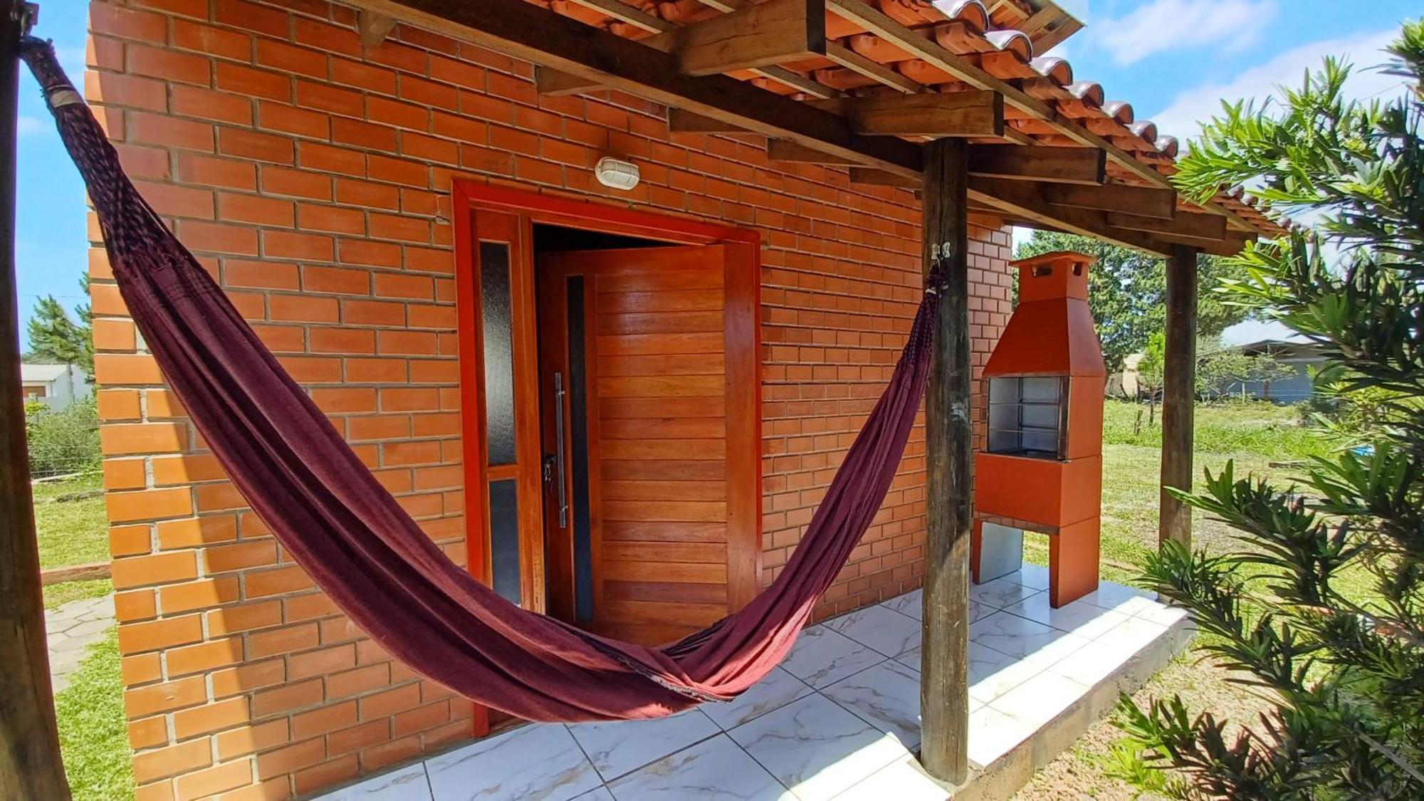 Chalé na Praia Itapeva Torres Exterior foto